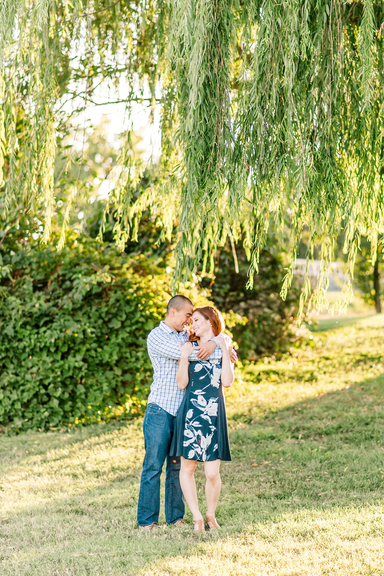 A classic summer engagement session at the Navy and Marine Memorial on Columbia Island, Washington D.C. by Fine Art Wedding Photographer Lauren R Swann