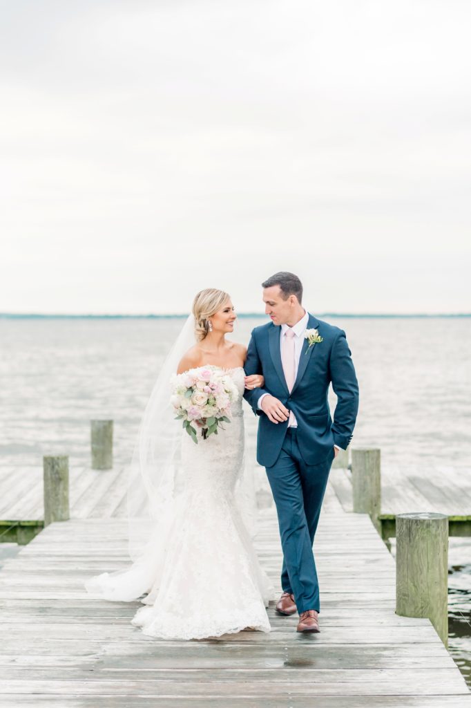 Bride and Groom on a Dock | A Fine Art Coastal Wedding Ceremony at Herrington by the Bay by Lauren R Swann