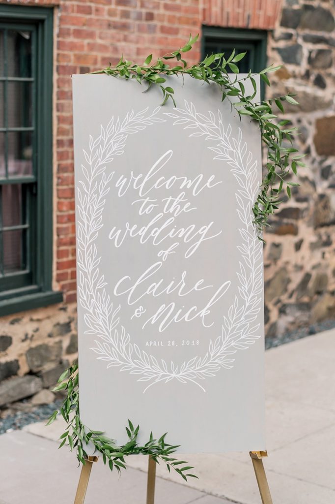Welcome Sign by Grove Lettering Co | Mt. Washington Mill Dye House wedding in Baltimore as photographed by Lauren R Swann Photography and planned by Adriana Marie Events. Featuring blush, romantic details for couples seeking an industrial and elegant day!