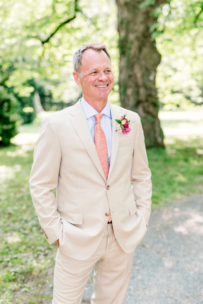 The Groom | An Intimate Oatlands Plantation garden wedding featuring bold citrus colors photo