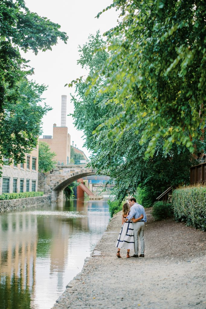 A couple strolling through Georgetown DC along the Canal