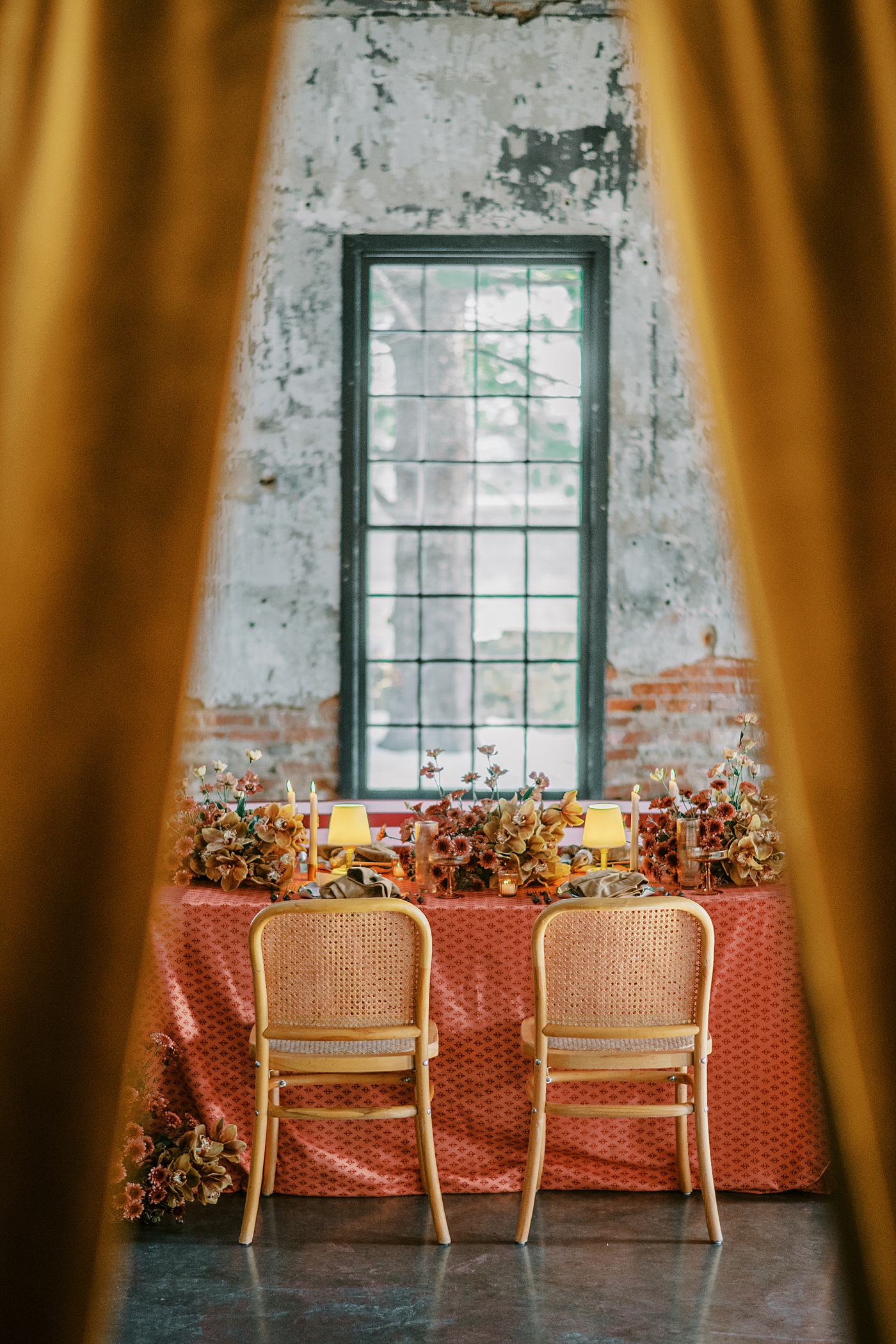 Luxury fall wedding tablescape formula from a DC wedding photographer. Patterned linens, candlelight, florals, and elevated reception details designed to photograph beautifully and feel timeless.